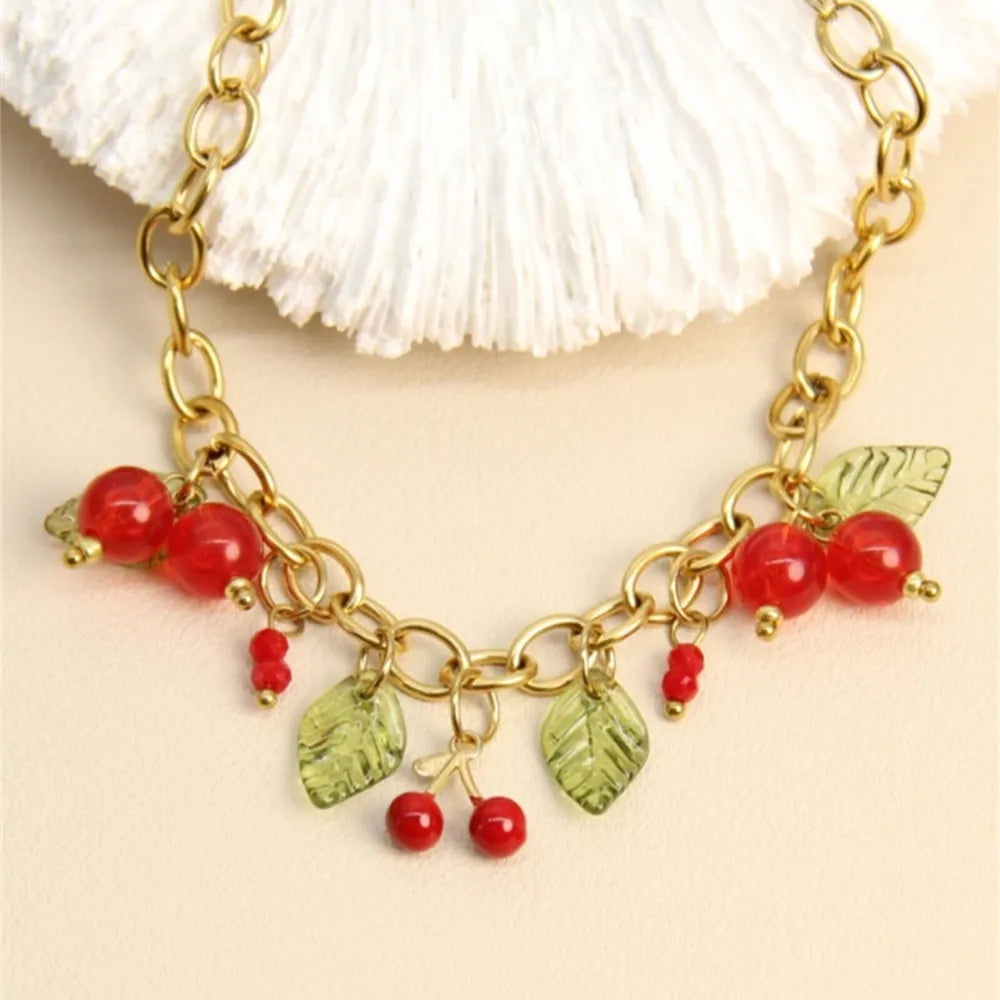 Bracelet Cerises & Feuilles – Le charme acidulé