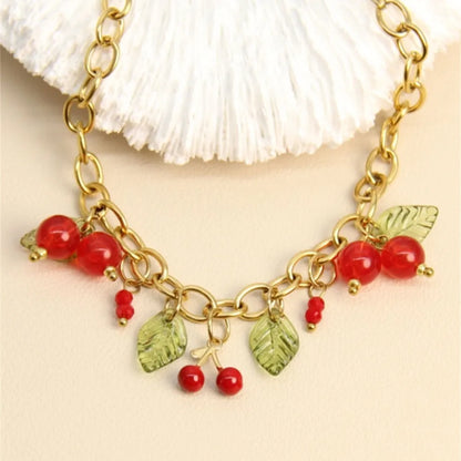 Bracelet Cerises & Feuilles – Le charme acidulé